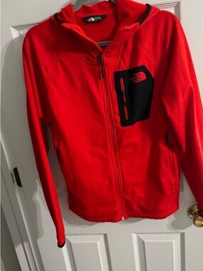 The North Face Red Hooded Performance Jacket with Black Chest Pocket